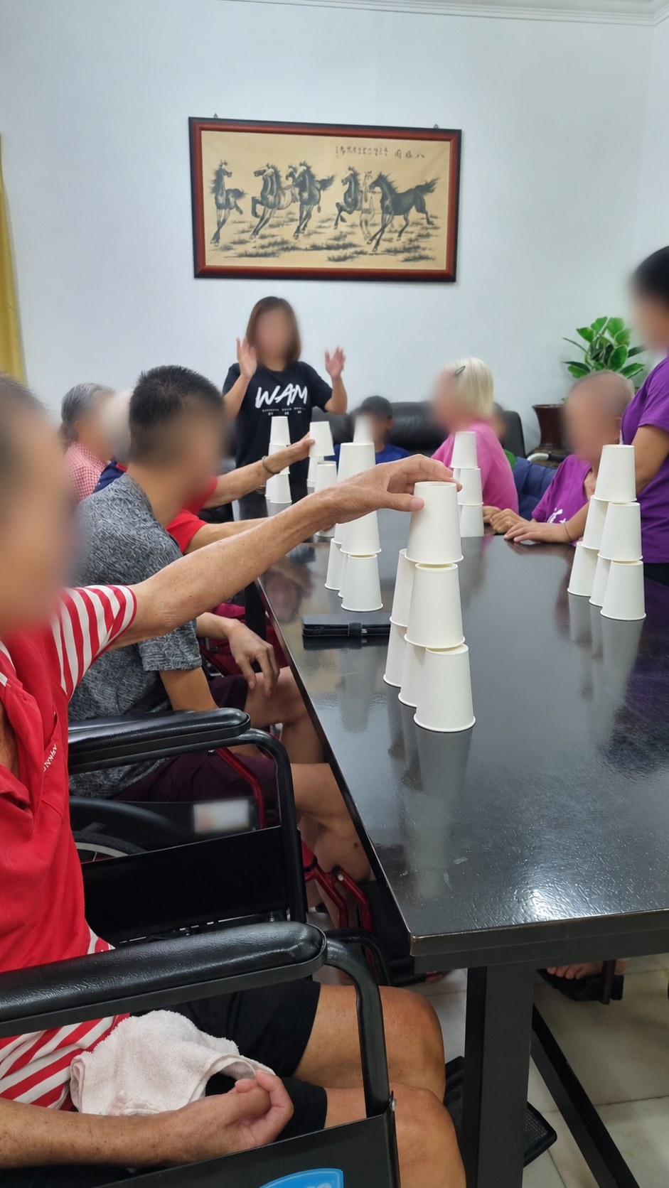 Group cup stacking game