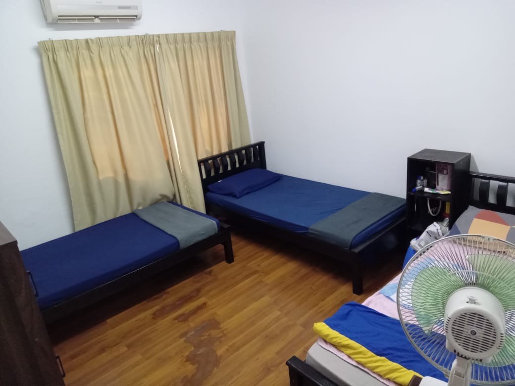 Shared bedroom with blue bedding